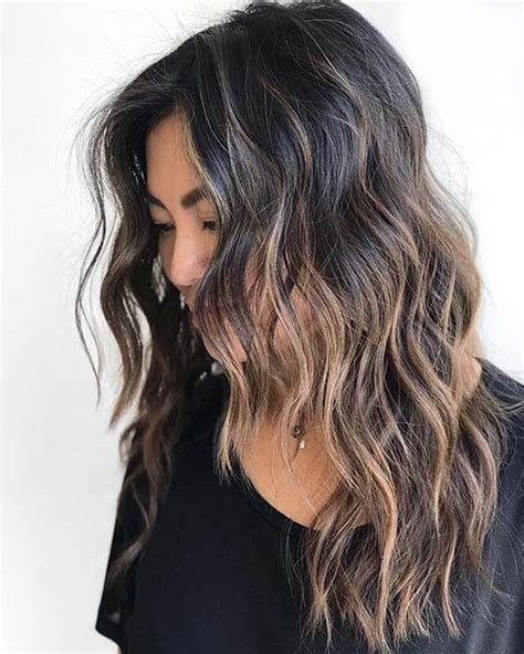 The hairstyle shown in the picture proves how amazing black hair highlights be when paired with some voluminous spiral curls and a popping golden color. 21 Chic Examples of Black Hair with Blonde Highlights ...