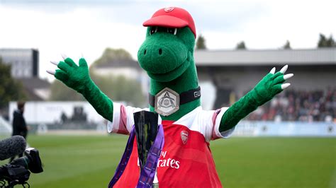 Welcome to arsenal's official youtube channel watch as we take you closer and show you the personality of the club. Beloved Arsenal mascot Gunnersaurus to continue role ...