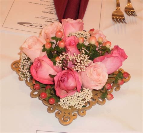 Shop our best selection of kitchen & dining room furniture to reflect your style and inspire your home. Picture frame floral centerpiece | Floral centerpieces ...