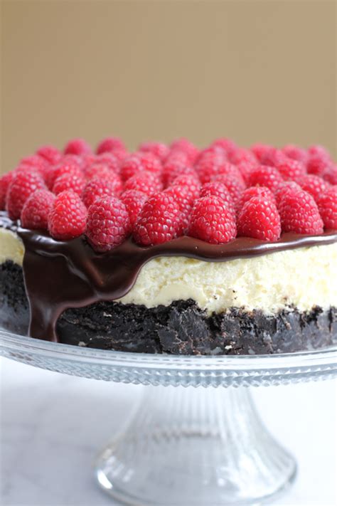Three airy layers of chocolate goodness on top of an oreo crust, is simply hard to resist. Raspberry Cheesecake with Oreo Crust - Hip Foodie Mom