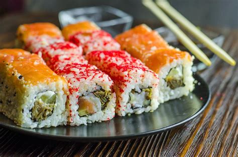 Two Types Of Sushi Rolls With Flying Fish Roe Stock Image Image Of