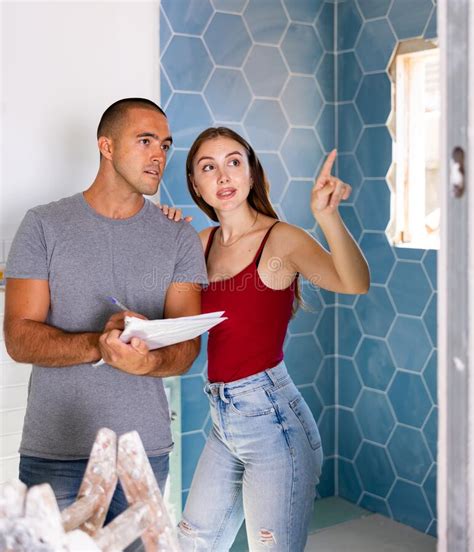 Couple Planning Repair Works In Bathroom Stock Image Image Of