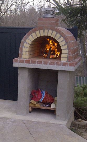 Standard red construction bricks should not be used for the oven, as they can explode under such high heat. BrickWood Ovens - Tildsley Family Wood Fired Brick Pizza Oven