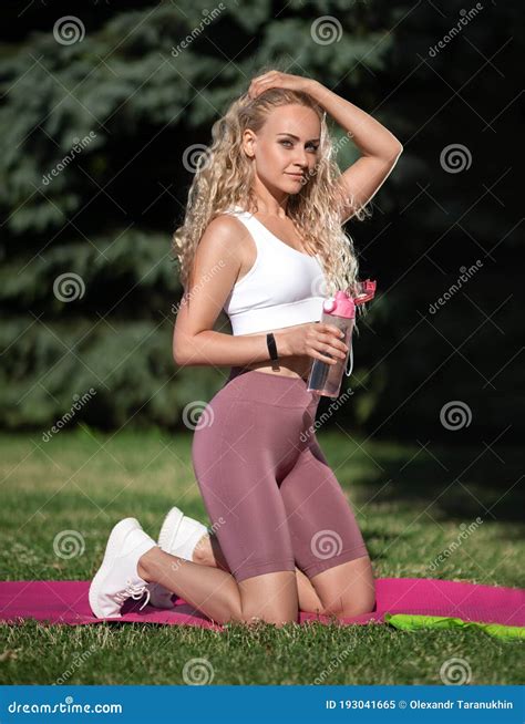 Woman With Perfect Legs Doing Sports Exercise Outdoor In The Park Stock Image Image Of