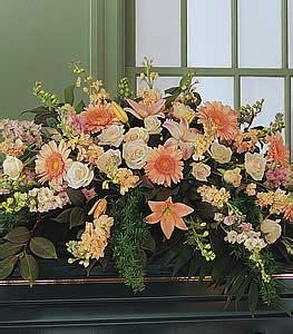 Funeral flower arrangements are a great way to share the pain and to heal your sorrow. Peach Comfort Half-Couch Spray - Casket Sprays $194.99 ...