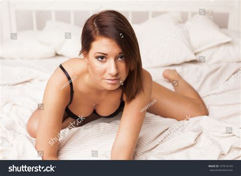 Sexy Beautiful Brunette Lingerie Woman Laying Stock Photo
