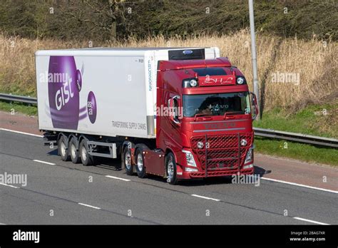 Gist Transforming supply chaints; Red DHL Haulage delivery trucks