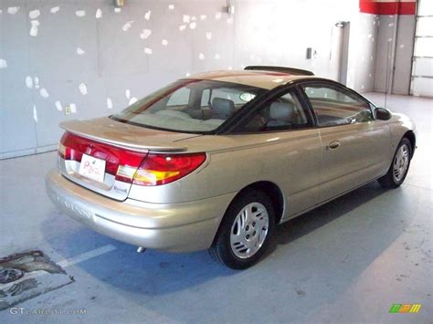 Toyota, honda, bmw, mercedes benz, chrysler, nissan and it is all about driving your dreams. 1999 Gold Saturn S Series SC2 Coupe #25195855 Photo #6 | GTCarLot.com - Car Color Galleries