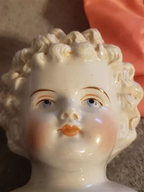 Antiquevintage German Hertwig Blonde China Head Doll With Soft Body