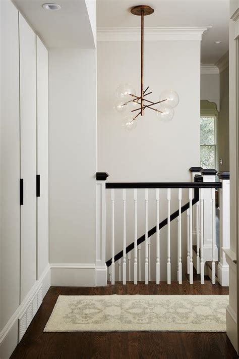 Amazing gallery of interior design and decorating ideas of hallway built in cabinets in closets, dens/libraries/offices, bathrooms, laundry/mudrooms, kitchens, entrances/foyers by elite interior designers. Staircase Built Ins - Traditional - entrance/foyer ...