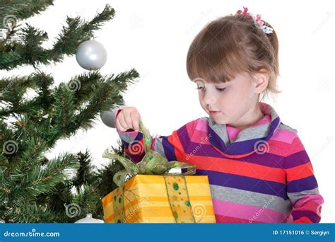 Pretty Little Girl Is Opening A Christmas T Stock Photo Image Of