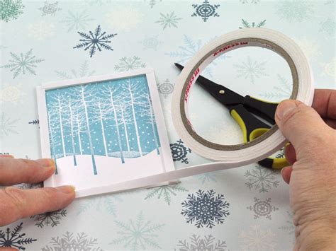Try to place your card base on evenly. Falling Snow Holiday Shaker Card | HGTV