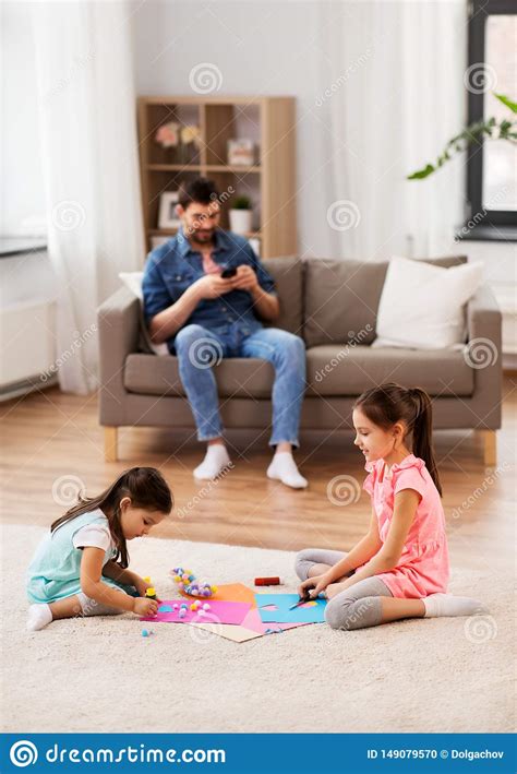 Happy Sisters Doing Arts And Crafts At Home Stock Photo Image Of