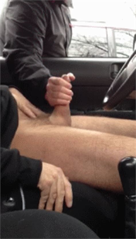 GAY MANS PLEASURE JERKING OFF IN THE CAR
