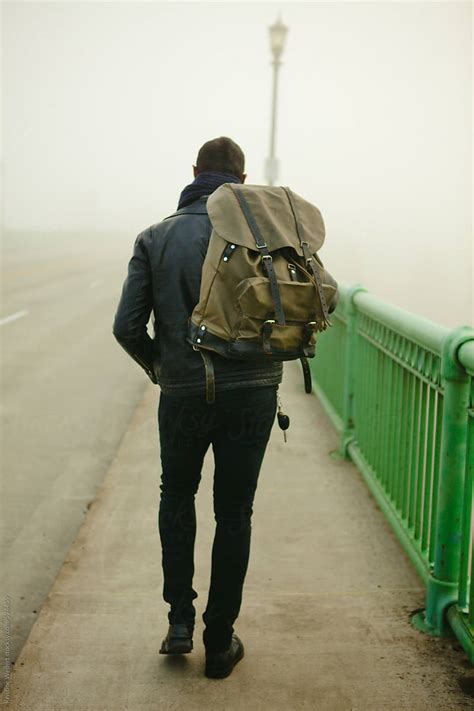 Man Walking Away Into The Fog By Kristine Weilert Stocksy United