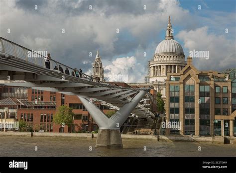 St Pauls Cathedral And The Millennium Bridge In London United Kingdom