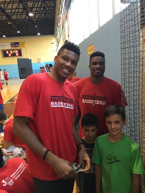Born in greece to nigerian parents. Giannis Antetokounmpo and his brother with young fans. | Basketball players, Gianni, College ...