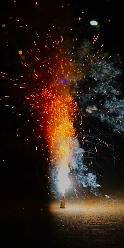 Download 1080x2160 Wallpaper Fireworks Night Smoke Celebration
