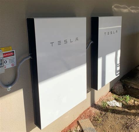 How Many Solar Panels Does It Take To Charge A Tesla Powerwall 2