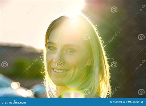 Attractive Blond Woman Backlit By Sun Flare Stock Image Image Of Head Flare 162127645