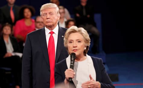 why was trump lurking behind clinton how body language dominated the debate the washington post