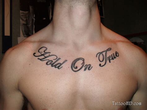 Ambition word with flying birds tattoo on man chest. Tattoos For Men On Chest Words | Great Tattoos