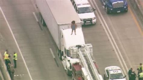 Naked Woman Climbs Atop Semi In Houston Brings Traffic To Standstill