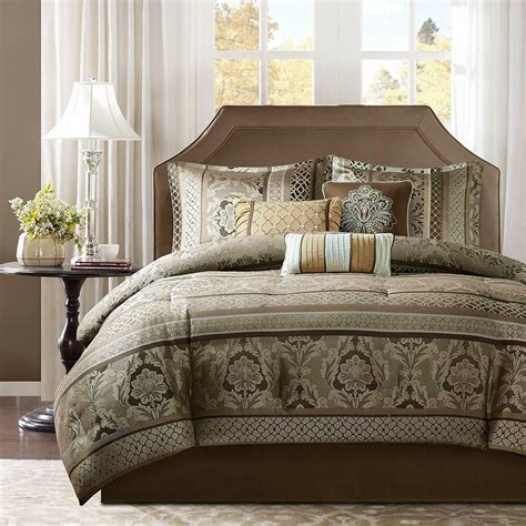 Need a new comforter for your queen bed? Madison Park Brown & Gold Bellagio Comforter Set