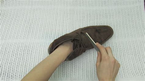 Start by blotting excess moisture before using an eraser to tackle stains. 4 Ways to Clean Suede Shoes - wikiHow