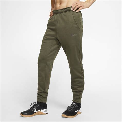Nike Therma Tapered Training Pants In Green For Men Lyst