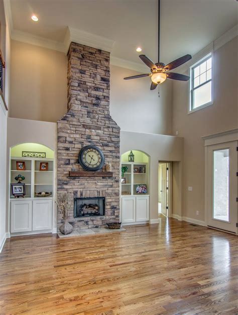 Bold colors and daring animal prints mean than the eva fireplace. Large stone gas fireplace, built in bookcases, vaulted ...