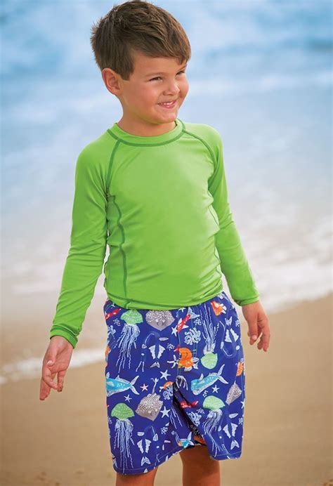 From Cwdkids Solid Long Sleeve Rash Guard And Ocean Life Swim Trunks