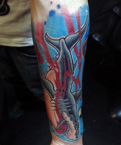 Bracelet designs for women and tribal armbands for men. Medium size colored forearm tattoo of bloody shark ...