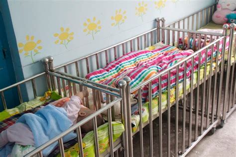 Cribs With Babies In The Orphanage Photo
