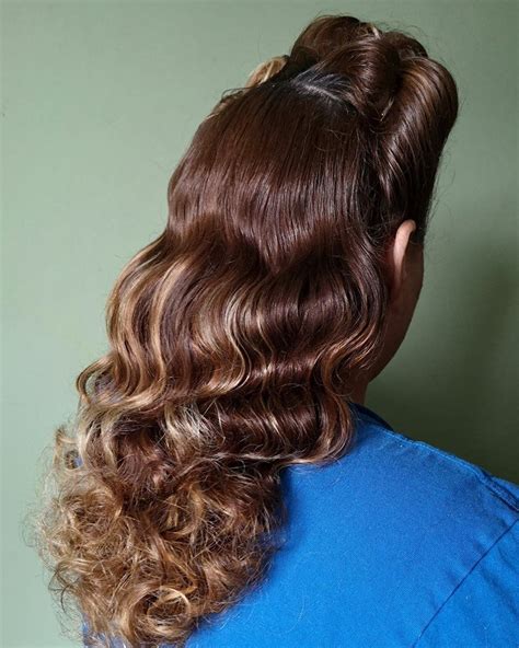 Younger women or those who favored longer hairstyles chose a basic combed curl set, or opted for a deep part to one side/center with hair pinned back past the. Pin by Rick Locks on 1940s hair | 1940s hairstyles, Long ...