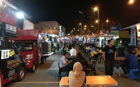 Fully fitted kitchen equipments with working tables and standing chiller. List of Food Truck Hotspots in Malaysia - Makan Truck