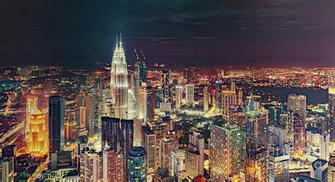 Ascott kuala lumpur features luxurious apartments with free internet access. Kuala Lumpur skyline aerial night view Photograph by ...