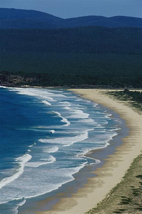 Waves Along A Pristine Beach In Disaster Bay At Ben Boyd National