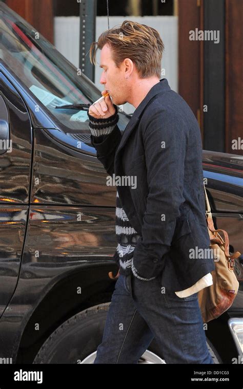 Ewan Mcgregor Leaving His Manhattan Hotel With Turn Up Jeans And Smoking A Cigarette New York