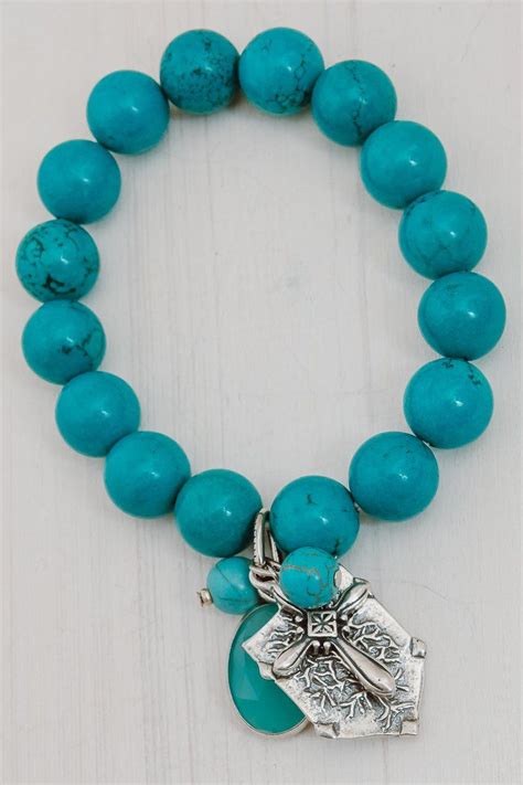 Turquoise Charm Bracelet With Tree Of Life Cross Stones And Crystal