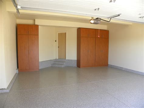 The garage cabinets were designed to perfectly fit the residential garage yet, are sturdy enough to handle industrial and auto repair shops. wood finish garage cabinets storage solutions garage floor ...
