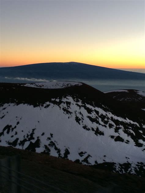 View Of Maui From The The Snow Capped Summit At Mauna Kea Volcano