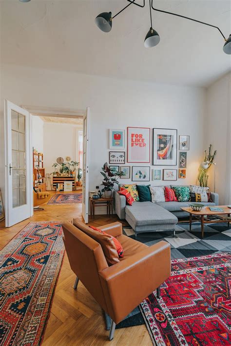 Maybe you would like to learn more about one of these? Mid-century boho living room with oriental rugs and large ...
