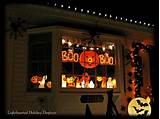Displaying some small Halloween vintage blowmolds in front bay window ...