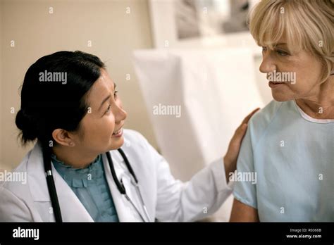 Female Doctor Consulting With A Patient After A Medical Examination In