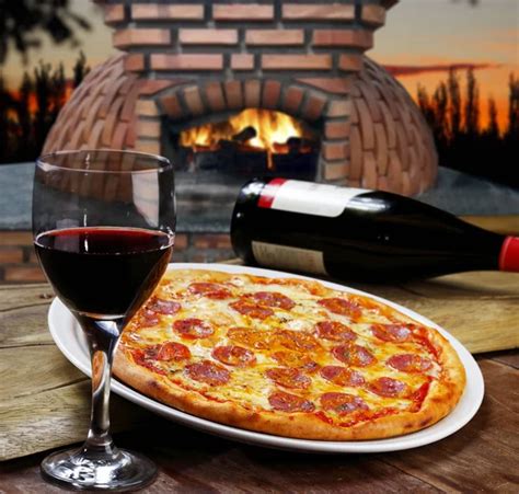 Tasty Pepperoni Pizza And Red Wine Set Close Up View Stock Image