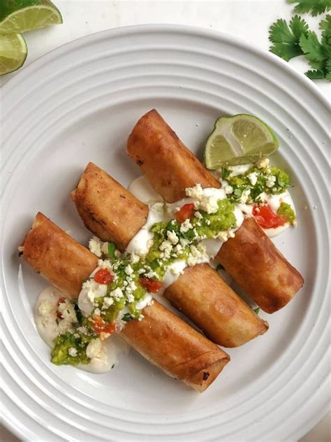 To serve, arrange flautas on a platter of shredded lettuce and serve with avocado. Chicken Flautas | Chicken flautas, Mexican food recipes, Food