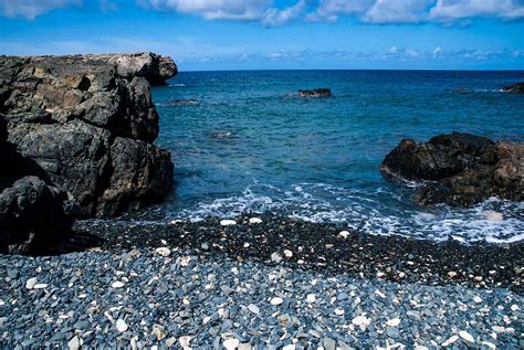 Trinity Natural Bridge Black Stone Beach Arubiana