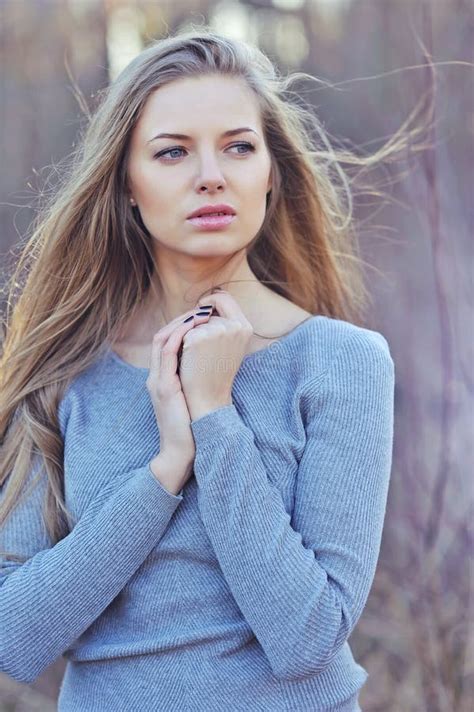 Beautiful Woman With Long Blond Hair Close Up Portrait Of A Fashion Model Posing Outdoor Stock