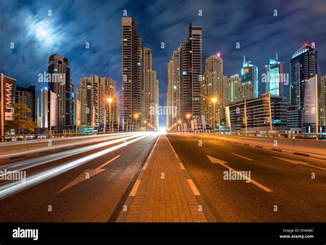 Cityscape With Illuminated Skyscrapers In Dubai United Arab Emirates